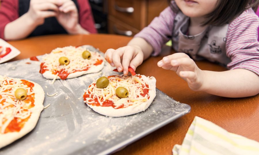 Children Preparing Mini Pizzas